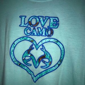 Women’s turquoise short sleeve shirt size large